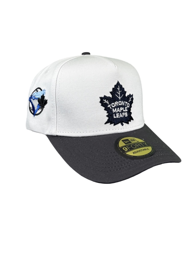 IMG_5950.jpeg کلاه نقابدار بیسبالی اسنپ بک (ADJUSTABLE) مارک TORONTO MAPLE LEAFS سفید مشکی کد 069 - Image 1